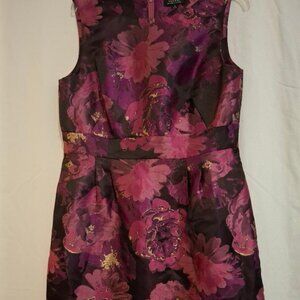 Elie Tahari Purple Sleeveless Sheath with gold Accents and Black Background